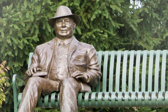 Picture of Paul G Duke statue in Duke Park sitting on a bench.
